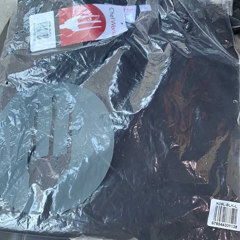 Black chefs jacket.   Never worn